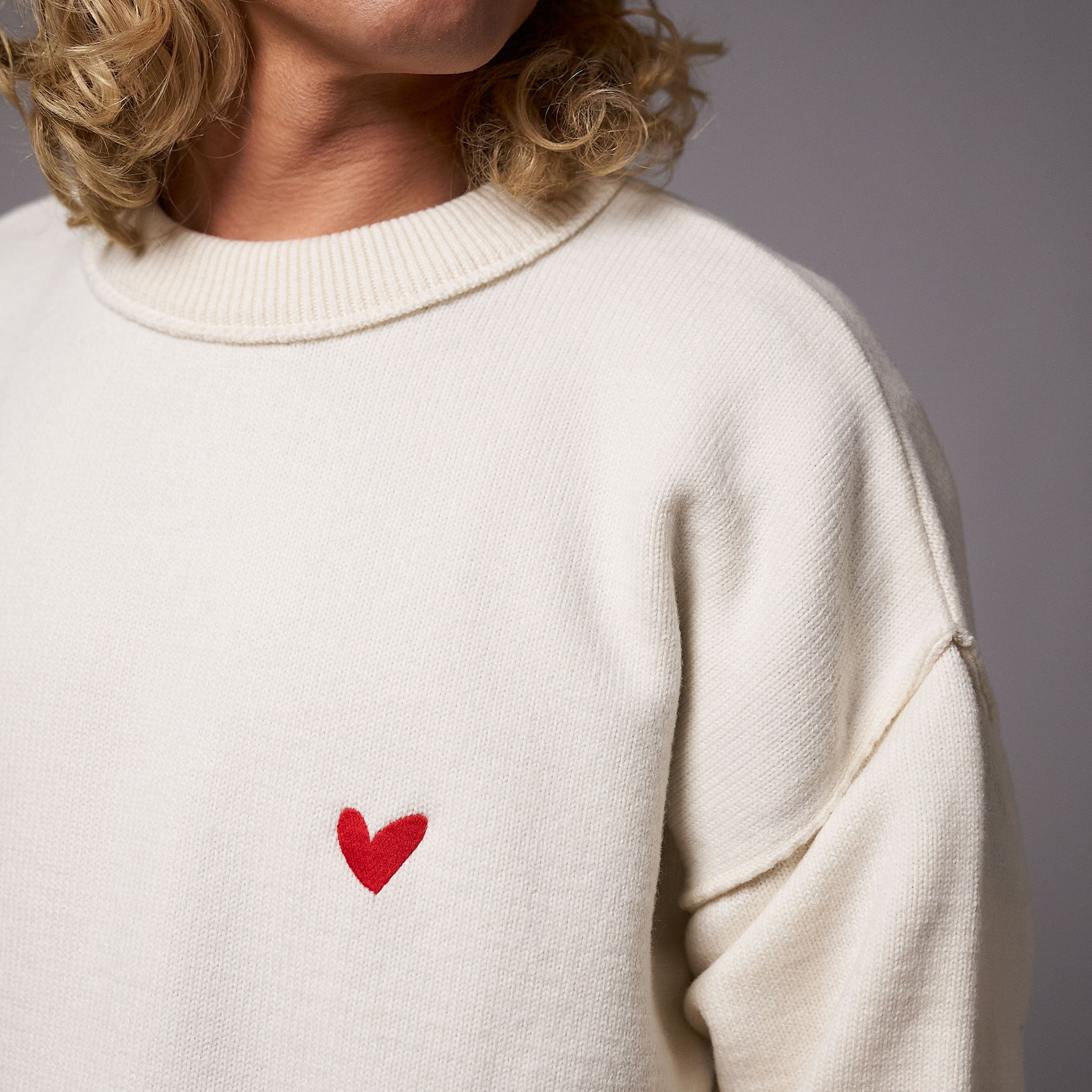 Strickpullover aus Merinowolle mit Herz Logo