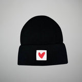 Gerippte Merino Wollmütze mit Herz Logo